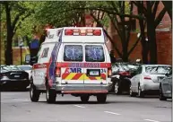  ?? Arnold Gold / Hearst Connecticu­t Media file photo ?? An AMR ambulance heads to a call in New Haven in May 2020.