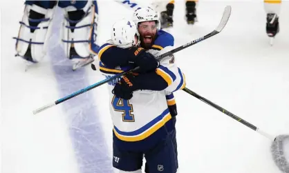  ??  ?? Carl Gunnarsson and Pat Maroon celebrate victory over the Bruins. Photograph: Greg M Cooper/USA Today Sports