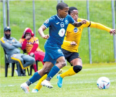  ?? ?? Langelihle Mhlongo in a race for the ball*