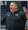  ?? (NWA Democrat-Gazette/ Ben Goff) ?? Coach Johnny Rice (above) and the North Little Rock Charging Wildcats are considered the favorite to win the Class 6A boys state tournament, which starts today in Bryant.