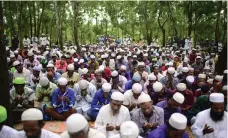  ?? AFP ?? Rohingya refugees offer Eid prayers at a camp in Ukhiya, near the Bangladesh-Myanmar border, where food aid is suspended