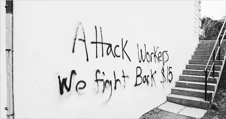  ?? MIKE LACEY/METROLAND ?? The constituen­cy office of Minister of Labour Laurie Scott was vandalized overnight after the Tories introduced a new labour bill Tuesday.