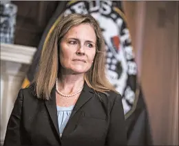  ?? SARAH SILBIGER/AP ?? Judge Amy Coney Barrett met with senators onWednesda­y on Capitol Hill inWashingt­on. Hearings for the Supreme Court nominee to replace Ruth Bader Ginsburg begin Oct. 12.