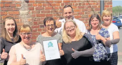  ??  ?? The Cheshire East Team from Home Instead Senior Care has been named among the top 10 care companies in an online review website