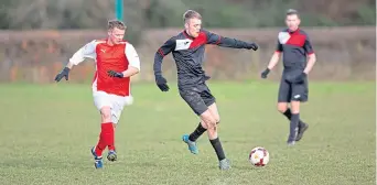  ??  ?? Clark’s (red and white) defeated Lochee Albion 6-2.