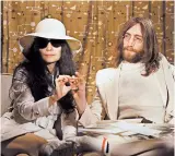  ?? AP FILE PHOTO ?? John Lennon and his wife, Yoko Ono, are pictured in 1969.