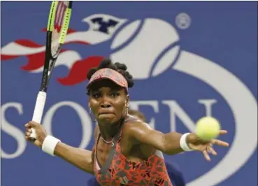  ?? KATHY WILLENS — THE ASSOCIATED PRESS ?? Venus Williams prepares to hit a forehand during the third set of a quarterfin­al against Petra Kvitovaat the U.S. Open tennis tournament in New York on Sept. 5.