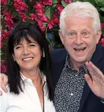  ??  ?? Relief: With partner Richard Curtis