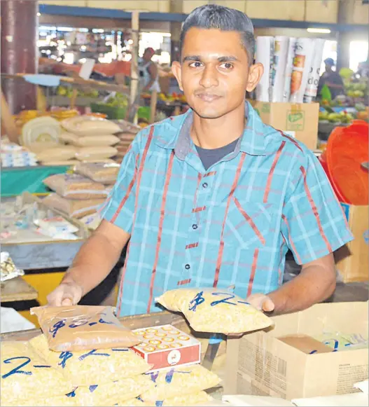  ?? Picture: SHIRAZ KASIM ?? Shofeed Saiyad Ali at his uncle’s lentils and spices stall at the Lautoka Municipal Market building.