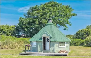  ??  ?? FIND YOUR FAIRYTALE At Coastal Cabins, above. A quaint caravan at Walcot Hall, top left