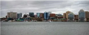  ?? RYAN TAPLIN • THE CHRONICLE HERALD ?? The Halifax skyline is seen from King’s Wharf in Dartmouth.