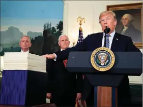  ?? MANUEL BALCE CENETA / ASSOCIATED PRESS ?? President Donald Trump speaks about the $1.3 trillion spending bill March 23 in the Diplomatic Room of the White House.