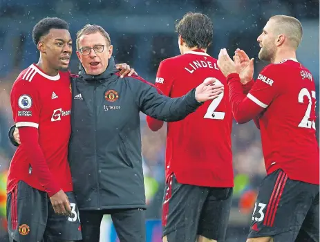  ?? ?? UNITED: Red Devils manager Ralf Rangnick congratula­tes his players at full-time at Elland Road yesterday.