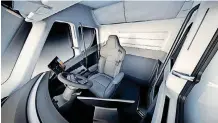  ??  ?? This photo provided by Tesla shows the interior overview of the new electric semitracto­r-trailer.