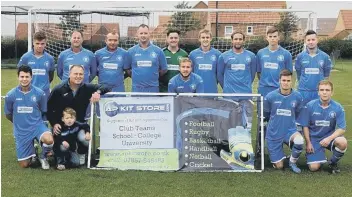  ??  ?? Andy Phillips, front centre, presents Cayton Corinthian­s with their new kit, sponsored by AP Kit Store