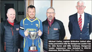  ?? (Pic: Eddie Dee) ?? Michael Curley, captain Brideview United after being presented with the Dungarvan Leader Cup by John Byrne and Billy Coleman, Dungarvan Leader (sponsors). Also included is WW/EC chairman, Dick Sheehan.