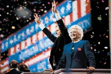  ?? GREGORY SMITH/CORBIS VIA GETTY FILE ?? President George Bush and first lady Barbara attend the 1992 Republican National Convention in Houston. She later revealed she disgareed with him on the issues of abortion and assault weapons.