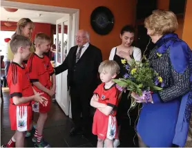  ??  ?? Emma Mhic Mhathúna and her children meet President Michael D Higgins and his wife Sabina in Co Kerry