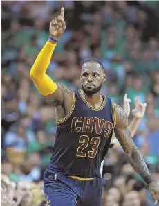  ?? STAFF PHOTO BY MATT STONE ?? THE ONE: LeBron James lets the Garden crowd know who’s boss last night.