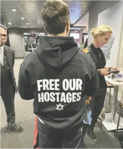  ?? LEORA SHEMESH ?? Gary Grill, who was wearing a sweatshirt with the slogan “Free Our Hostages” with a Jewish star was asked by MLSE to change his shirt or leave a Raptors game.