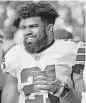  ?? Eric Risberg / Associated Press ?? Ezekiel Elliott is again given new life to play in the NFL, giving the Cowboys “a burst of adrenaline,” he says.