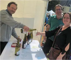  ?? | PHOTO : OUEST-FRANCE ?? Pascal Janvier fait déguster son millésime 2022 au salon des vins sarthois, ce week-end, à l’abbaye de l’Épau. Il exporte 70 % de sa production.