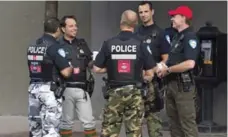  ?? THE CANADIAN PRESS ?? A nearly three-year-long protest over police pensions had on-duty officers wearing everything from army camo pants to baseball breeches.