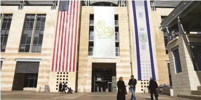  ?? (Reuters) ?? US AND Israel flags displayed in Jerusalem after Washington recognized Jerusalem as the capital.