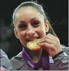  ?? (AP file photo) ?? U.S. gymnast Jordyn Wieber, now the head coach at Arkansas, bites her gold medal at the artistic gymnastics women’s team final at the 2012 Summer Olympics in London. Wieber helped the US women’s team to its first Olympic title since 1996.