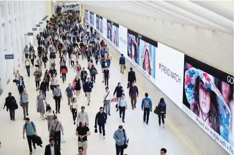  ?? AP ?? The World Trade Centre station in New York. The ‘Great Reinventio­n’ is being driven by the search for fulfilment and happiness