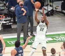  ?? JEFF HANISCH / USA TODAY ?? Khris Middleton said the Bucks will get in touch with the Timberwolv­es to talk over how they feel about playing Wednesday.