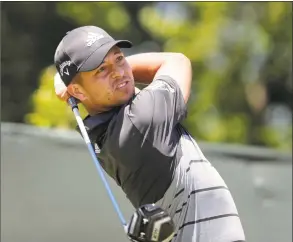  ?? Julio Cortez / Associated Press ?? Xander Schauffele plays his shot from the fourth tee during Sunday’s final round of the U.S. Open in Southampto­n, N.Y.