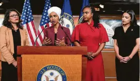  ?? J. Scott Applewhite / Associated Press ?? U.S. Reps. Rashida Tlaib, from left, Ilhan Omar, Ayanna Pressley and Alexandria Ocasio-Cortez respond to remarks by President Donald Trump after he called for four Democratic congresswo­men of color to go back to their “broken” countries. All four congresswo­men are American citizens.