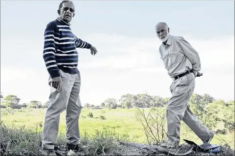 ?? Picture: JODI WINDVOGEL ?? BACK HOME: Rashaad Solomon, left, and Mogamat Noor Solomon point out land in Constantia for which they recently received title deeds.