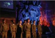  ?? (AP/Maya Alleruzzo) ?? Israeli soldiers attend the opening ceremony of the Holocaust Martyrs and Heroes Remembranc­e Day Wednesday at Yad Vashem Holocaust Museum in Jerusalem.