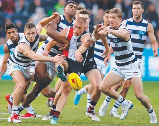  ?? Picture: GETTY IMAGES ?? The Cats pounce on the Saints’ Sebastian Ross during the one-sided clash in Geelong.