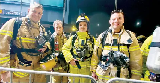  ?? ?? Kingsley Lucas, Alex Gobbett, Jesse Craig and Quentin Leuridan all kitted up ready for the annual Stair Climb.