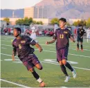  ?? ROBERTO E. ROSALES/JOURNAL FILE ?? Highland’s boys soccer team had players from 10 countries. Nigel Mwamba (6) is from Congo. Jesus Aguilera is local.