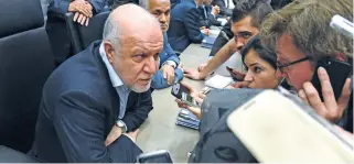  ??  ?? MAKING A POINT: Iran’s Oil Minister Bijan Zanganeh speaks to journalist­s before a meeting of OPEC oil ministers in Vienna, Austria, on Friday.