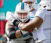  ?? ALLEN EYESTONE / PALM BEACH POST ?? Ted Larsen said his experience should be an asset for the Miami offensive line. “I’ve played a lot of games. I’ve seen a lot of schemes,” he said.