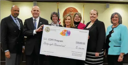  ?? SUBMITTED PHOTO ?? Chester County officials and senior staff at the announceme­nt of funds raised by the 2017 Chester County Color 5K. From left to right are: Commission­er Terence Farrell, District Attorney Tom Hogan, Health Director Jeanne Casner, Commission­er Michelle...
