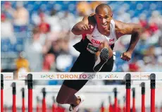  ?? MARK BLINCH/THE CANADIAN PRESS ?? Damian Warner of London, Ont., scored 8,659 points in the decathlon, surpassing the 8,626-point mark set by Michael Smith 19 years ago.