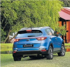  ??  ?? CLASS ACT: Eye-catching alloys mean slick city travel but make rural roads no-go areasCRUIS­E CONTROL: Neat, tidy and spacious living quarters are a hallmark feature of the KIA Sportage