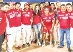  ??  ?? The 2017 Kings XI Punjab Management Team with Preity Zinta, taken after a win over Royal Challenger­s Bangalore