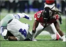  ?? JEFF HAYNES — AP IMAGES FOR PANINI ?? Falcons defensive end Adrian Clayborn (99) sacks Dallas Cowboys quarterbac­k Dak Prescott (4) during Sunday’s game in Atlanta.