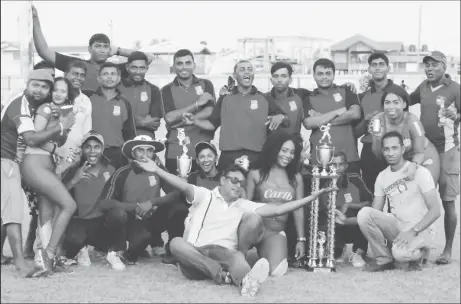  ?? (Romario Samaroo photo) ?? Champions! The successful Enterprise Busta Sports Club along with the sponsors and organisers take a photo opportunit­y after the finals at Enmore Community Center