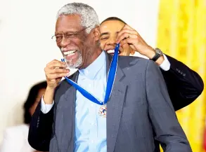  ?? — AFP file photo ?? Former US President Barack Obama awards the Medal of Freedom to NBA basketball hall of famer and human rights advocate Bill Russell during a ceremony at the White House in Washington, DC1.