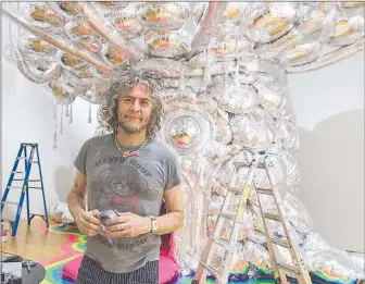  ?? Photo courtesy: George Salisbury ?? What started as a “freak-out experience” that could be enjoyed during one of the Flaming Lips’ drug-fueled, late-night parties in their hometown of Oklahoma City has expanded to encompass a whole world. Lead singer Wayne Coyne’s immersive art installati­on “King’s Mouth” went through several iterations to become what it is today.