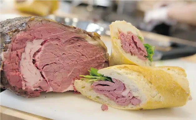  ?? Photos: Gavin Young/ Postmedia News ?? Prime rib sandwiches featuring triple A Alberta beef — and little else — are a big hit at SAIT’s new culinary campus in downtown Calgary.