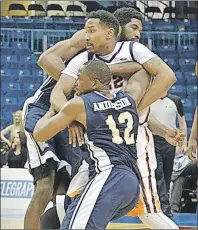  ?? TELEGRAPH JOURNAL PHOTO ?? Island Storm guard Rashad Whack, centre, tries to work through an Anthony Stover screen while defending Riptide guard Anthony Anderson Thursday in Saint John, N.B.